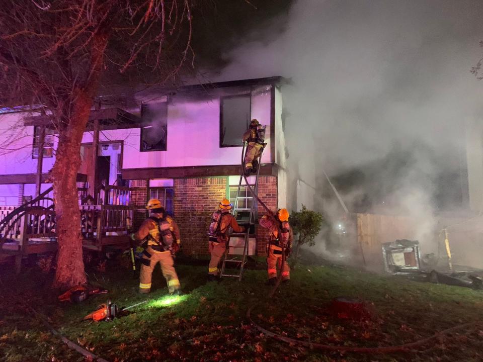 Firefighters work early Wednesday to extinguish a Northwest Austin fire in the 3900 block of Hawkshead Drive that started around a fireplace that was being used to heat the home, according to the Austin Fire Department. First responders have been responding to nonstop calls around the city as temperatures dipped below freezing.