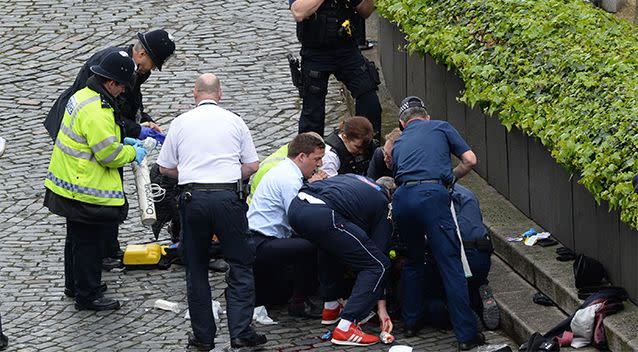 Paramedics at the scene of the attack. Photo: AAP