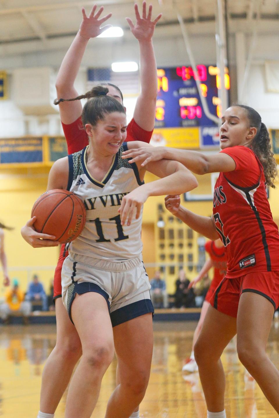 Bay View's Ava Wasylow battles for a rebound during the second quarter of Friday's win over Cranston West.