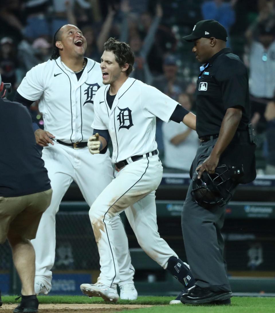 Miguel Cabrera (24) and Detroit Tigers third baseman Nick Maton (9) celebrate his three-run walk-off homer against San Francisco Giants relief pitcher Camilo Doval (no pictured) during 11th-inning action at Comerica Park in Detroit on Friday, April 14, 2023.