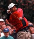 <p>Tiger Woods follows his tee shot on number two during practice for the Masters at the Augusta National Golf Club in Augusta, Ga., Tuesday, April 9, 1996. (AP Photo/Dave Martin) </p>