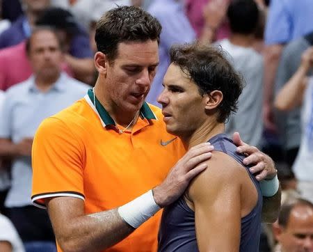 FILE PHOTO: Sept 7 2018; New York, NY, USA; Rafael Nadal of Spain (right) greets Juan Martin del Potro of Argentina after retiring from the men's semi-final match on day twelve of the 2018 U.S. Open tennis tournament at USTA Billie Jean King National Tennis Center. Mandatory Credit: Robert Deutsch-USA TODAY Sports/File Photo