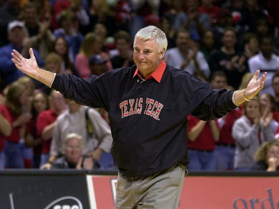 Texas Tech basketball coach Bob Knight is introduced during Midnight Madness in Lubbock, Texas, in this Oct. 12, 2001 file photo. The eyes of college basketball will be on Knight and Texas when the season starts, and most of the attention will shift to defending national champion Duke as it ends.  (AP Photo/LM Otero)