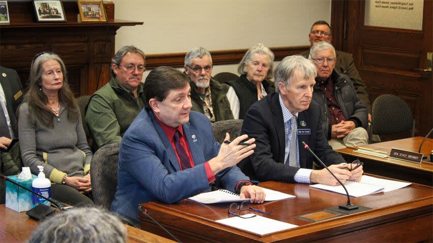 Maine Senate president Troy Jackson (blue blazer), pictured here presenting the final report of the Gagetown Harmful Chemical Study Commission with co-chair House member Ronald Russell, said a lot of people in his northern district trained at Base Gagetown.