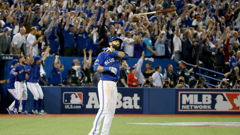 Jose Bautista's iconic bat flip has gone down as a top moment in Blue Jays history. (Photo by Tom Szczerbowski/Getty Images)