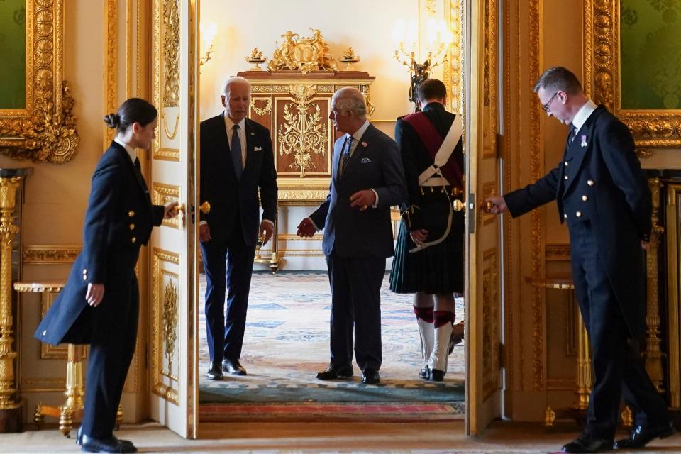 Britain's King Charles III, center right, meets with U.S. President Joe Biden at Windsor Castle, in Windsor, England, Monday, July 10, 2023 (AP)