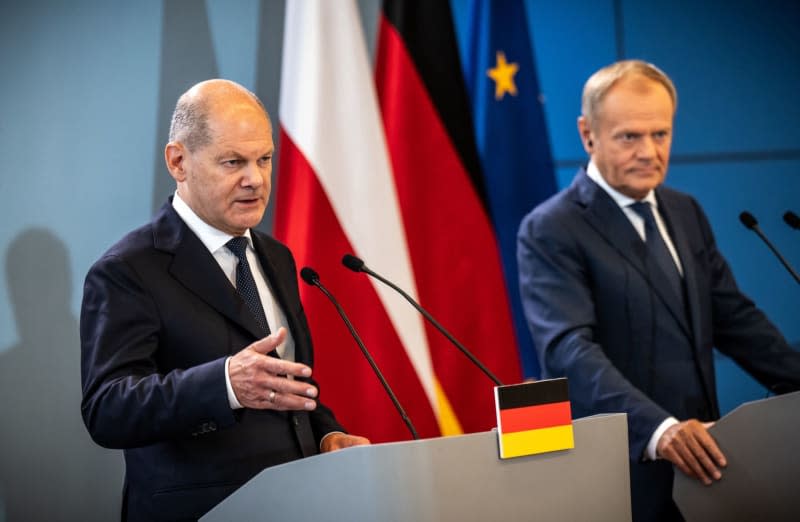 German Chancellor Olaf Scholz takes part in the press conference following the German-Polish government consultations alongside Donald Tusk (R), Prime Minister of Poland. These are the first government consultations with Tusk's center-left government, which replaced a right-wing conservative government led by Morawiecki at the end of last year. Michael Kappeler/dpa