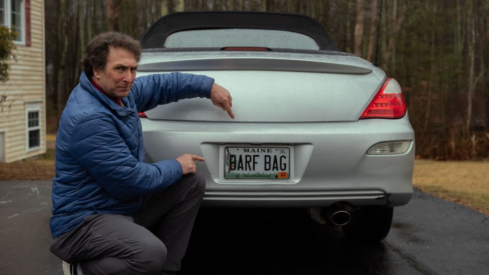 Steve Silberburg shows off his unique vanity plate, which is undoubtedly a point of interest around town. - Dramamine
