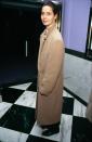 <p>Rossellini wears the Max Mara 101801 coat in 1991. (Photo: Courtesy of Max Mara) </p>