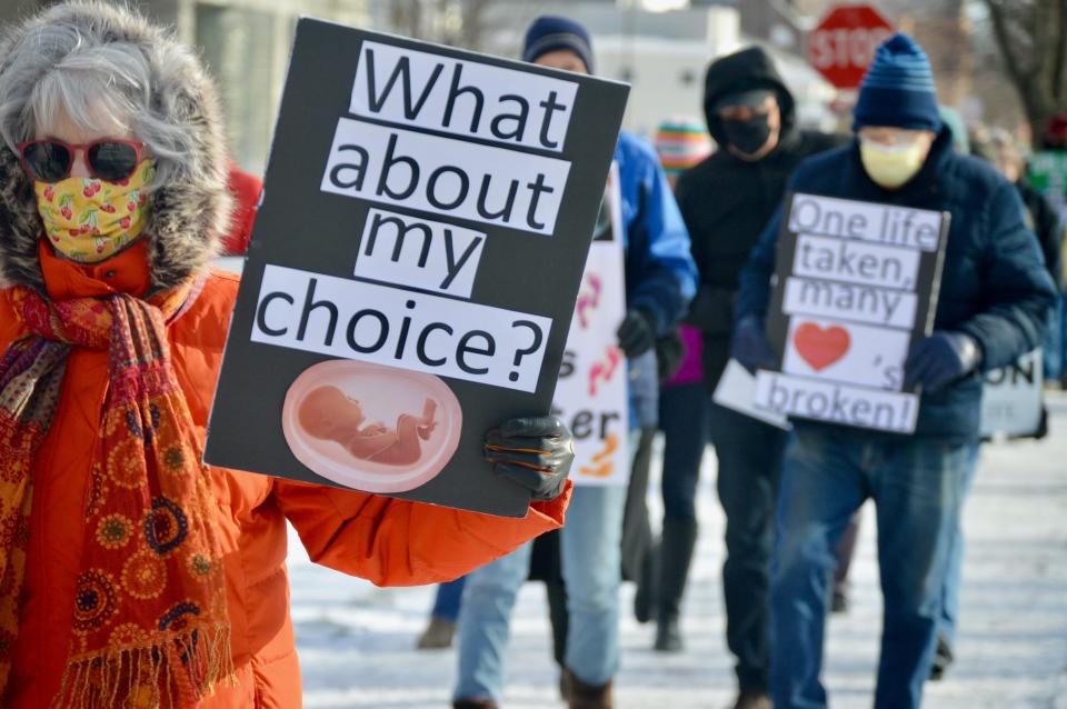 Right to Life of Holland supporters marched Saturday, Jan. 23, marking the anniversary of the 1973 Roe v. Wade decision which legalized abortion in the United States.