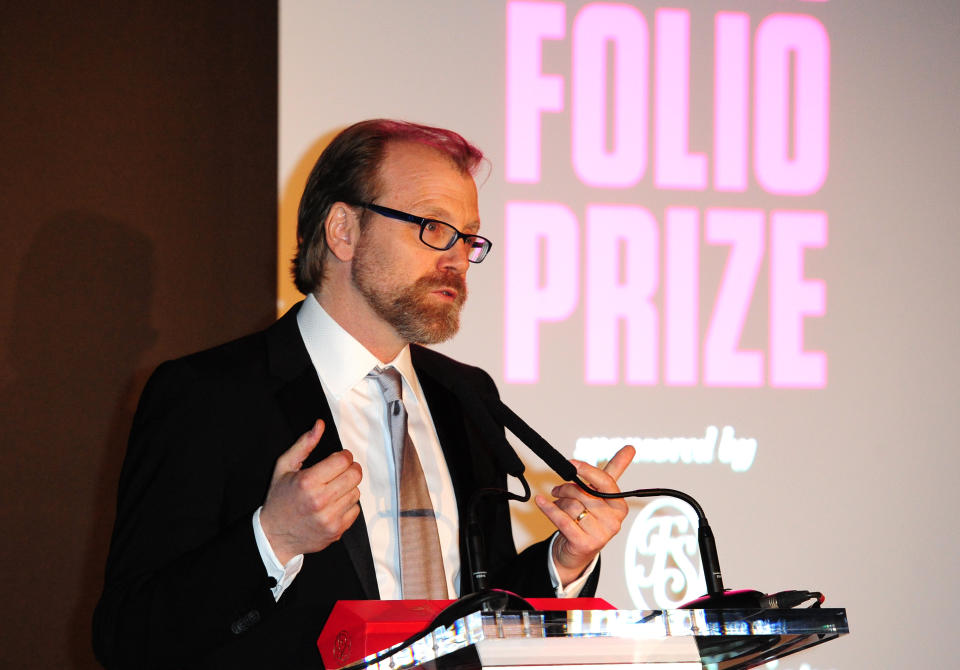 George Saunders gives a speech after winning the Folio Prize at the St Pancras Renaissance Hotel in London, Monday, March 10, 2014. The American writer has won the 40,000 pound ($67,000) Folio Prize for literature with his humorous and disturbing short-story collection "Tenth of December." The chair of the judging panel, poet Lavinia Greenlaw, said Monday that Saunders' "darkly playful" stories explore "the human self under ordinary and extraordinary pressure." Saunders beat seven other finalists, including Kent Haruf, Rachel Kushner, Anne Carson and Eimear McBride. (AP Photo/PA, Ian West) UNITED KINGDOM OUT