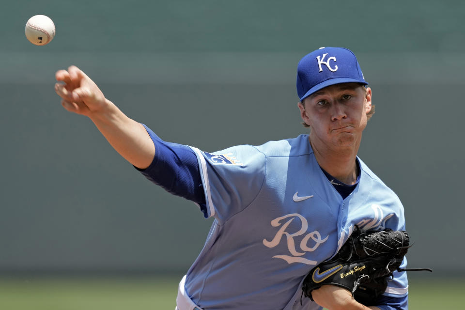 Kansas City Royals starting pitcher Brady Singer throws during the first inning of a baseball game against the Los Angeles Dodgers Sunday, July 2, 2023, in Kansas City, Mo. (AP Photo/Charlie Riedel)