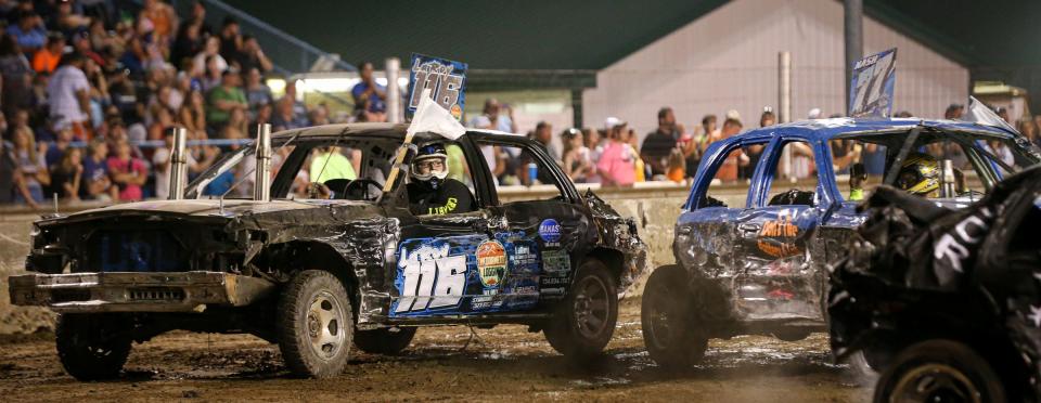 Justin Laroy, of Monroe in the car #116, eyes up the competition Tuesday evening at The Monroe County Fair Demolition Derby.