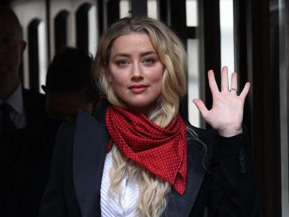 Actress Amber Heard arrives at the High Court in London for a hearing in Johnny Depp's libel case against the publishers of The Sun and its executive editor, 14 July 2020. (Yui Mok/PA)