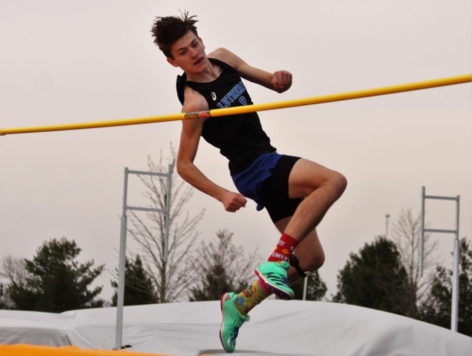 Lutheran senior Mason Kooi attempts the high jump during a track and field meet at Paul Jenkins Field in Williamsville on Tuesday, April 4, 2023.