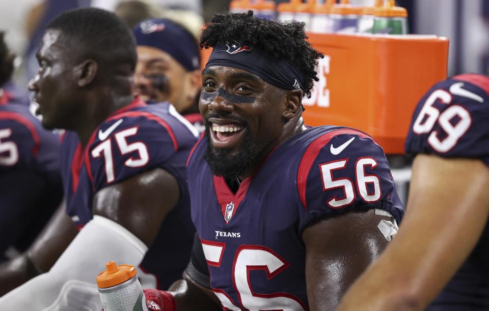 Aug 13, 2022; Houston, Texas, USA; Houston Texans defensive tackle Thomas Booker IV (56) on the bench during the game against the New Orleans Saints at NRG Stadium. Mandatory Credit: Troy Taormina-USA TODAY Sports