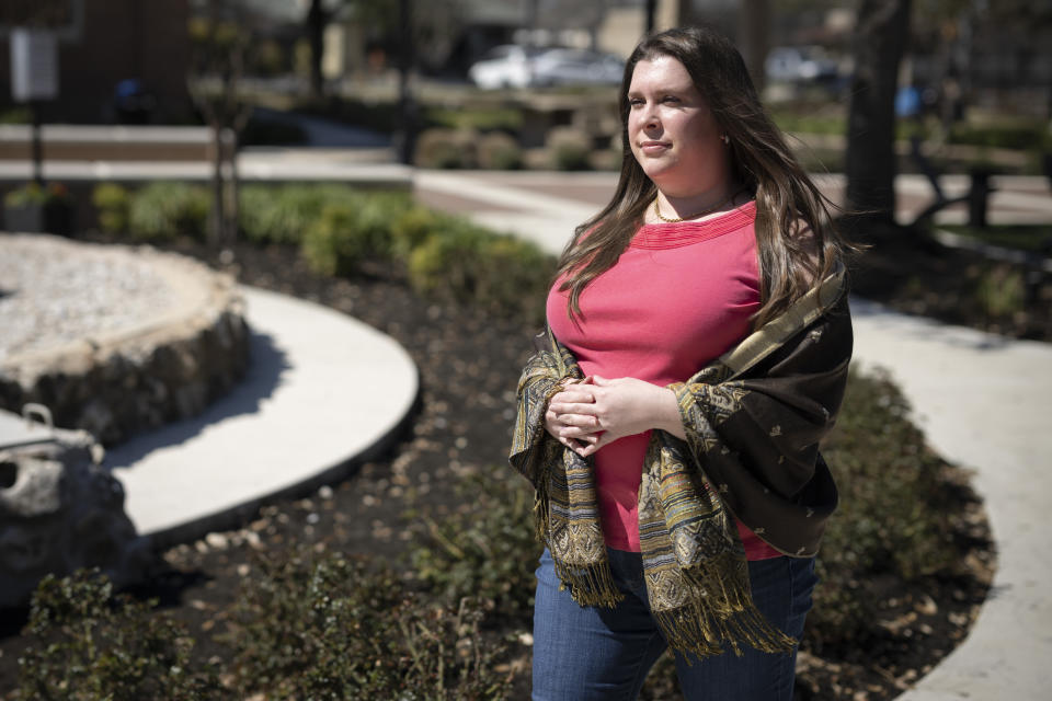 Internal Revenue Service employee Dixie Warden poses for a photograph on Saturday, Feb. 24, 2024, at Mary Kyle Hartson City Square Park in Kyle, Texas. Warden is quick to say she's “not a numbers girl.” But as the very first user of the government's free new electronic tax return filing system, Warden reports she completed her taxes this year using the program in about an hour. (AP Photo/Darren Abate)