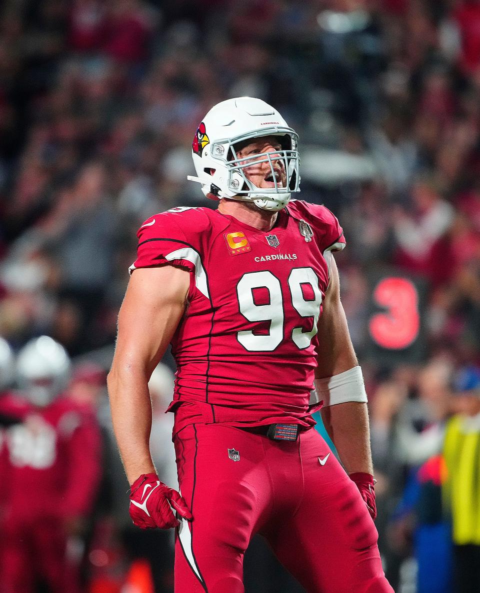 Cardinals JJ Watt (99) reacts after sacking Patriots quarterback Mac Jones (10) during the first half of a game at State Farm Stadium in Glendale on Dec. 12, 2022.