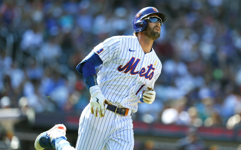 New York Mets' Jeff McNeil (1) rounds the bases after hitting a home run against the Seattle Mariners during the fifth inning of a baseball game, Sunday, Sept. 3, 2023, in New York. (AP Photo/Noah K. Murray)