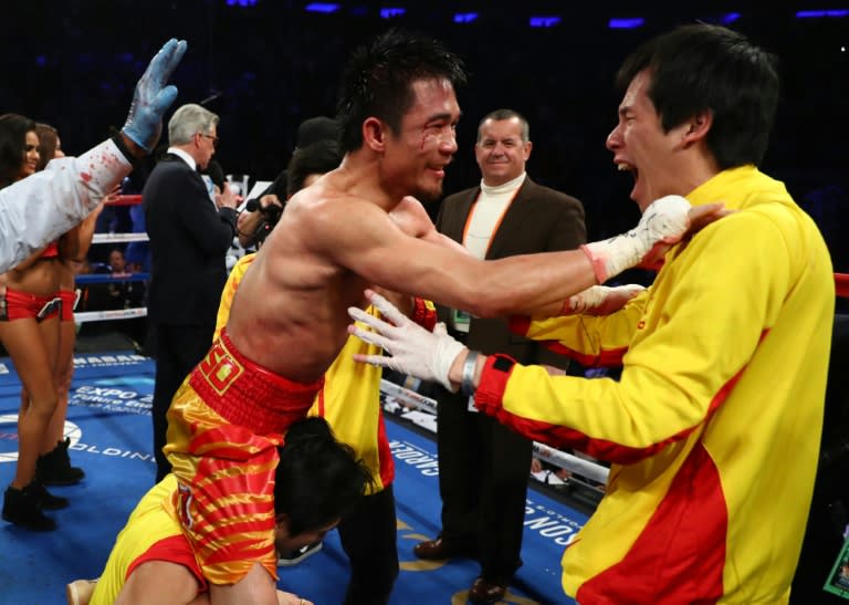 Srisaket Sor Rungvisai of Thailand celebrates a majority decision victory over Roman Gonzalez of Nicaragua to capture WBC super flyweight title, at Madison Square Garden in New York, on March 18, 2017