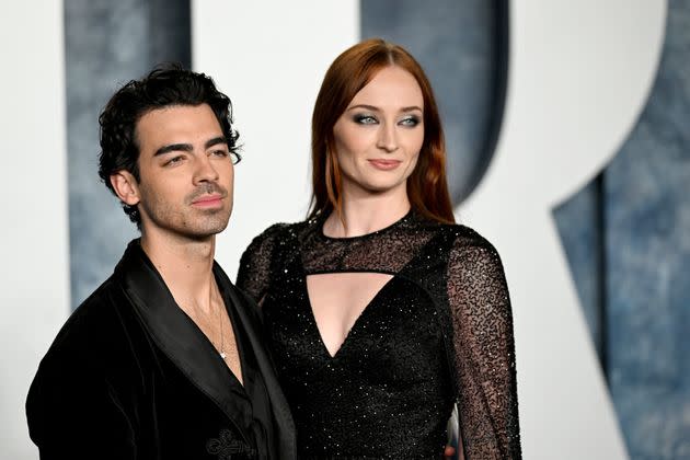 Joe Jonas, left, and Sophie Turner attend the Vanity Fair Oscar Party in March 2023. Turner has addressed their divorce for the first time in a recent interview.