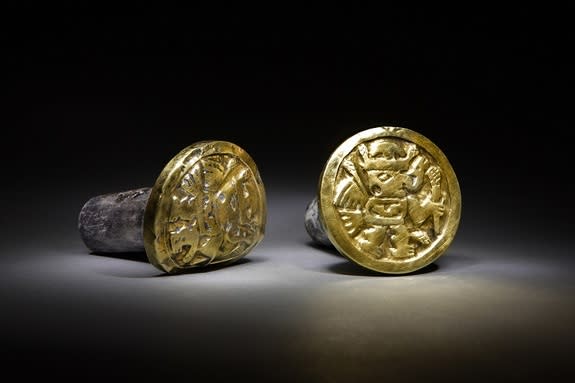 Images of winged beings adorn a pair of gold-and-silver ear ornaments a high-ranking Wari woman wore to her grave. Archaeologists found the remains of 63 individuals, including three Wari queens, in the imperial tomb at El Castillo de Huarmey.