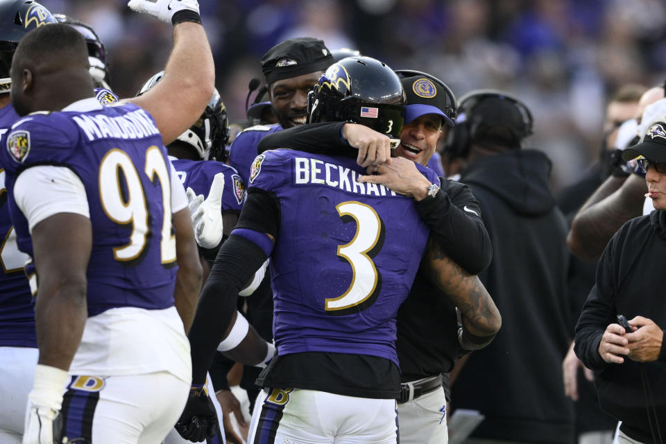 Baltimore Ravens wide receiver Odell Beckham Jr. (3) gets a hug from Baltimore Ravens head coach John Harbaugh after catching a 6-yard touchdown pass during the second half of an NFL football game against the Seattle Seahawks, Sunday, Nov. 5, 2023, in Baltimore. (AP Photo/Nick Wass)