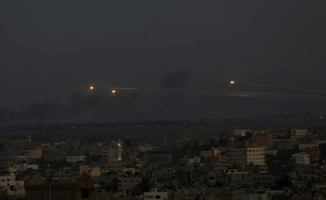 Palestinian rockets cross the sky