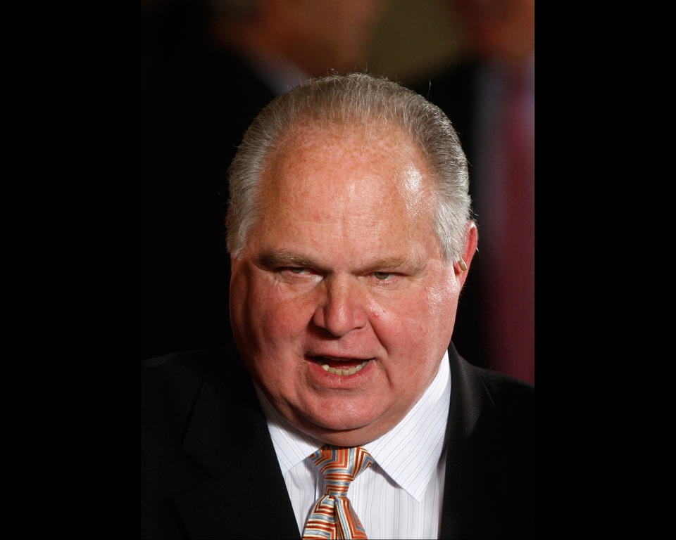 FILE - In this Jan. 13, 2009 file photo, conservative talk show host Rush Limbaugh talks with guests in the East Room of the White House in Washington. The uproar over Rush Limbaugh's comments about a young woman's sex life underscores the outsized role that conservative media figures play in Republican politics. Limbaugh, the late Andrew Breitbart and even Donald Trump have such faithful followers among the party's core supporters that Republican politicians often fear they'll pay a painful price for crossing them. (AP Photo/Ron Edmonds, File)