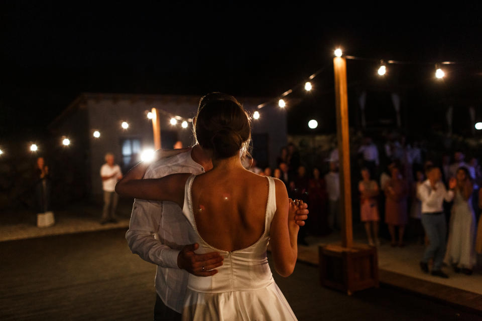 A couple dancing at their wedding