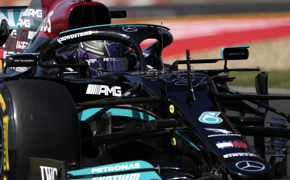 Mercedes driver Lewis Hamilton of Britain steers his car during the second free practice at the Hungaroring racetrack in Mogyorod, Hungary, Friday, July 30, 2021. The Hungarian Formula One Grand Prix will be held on Sunday. (AP Photo/Darko Bandic)