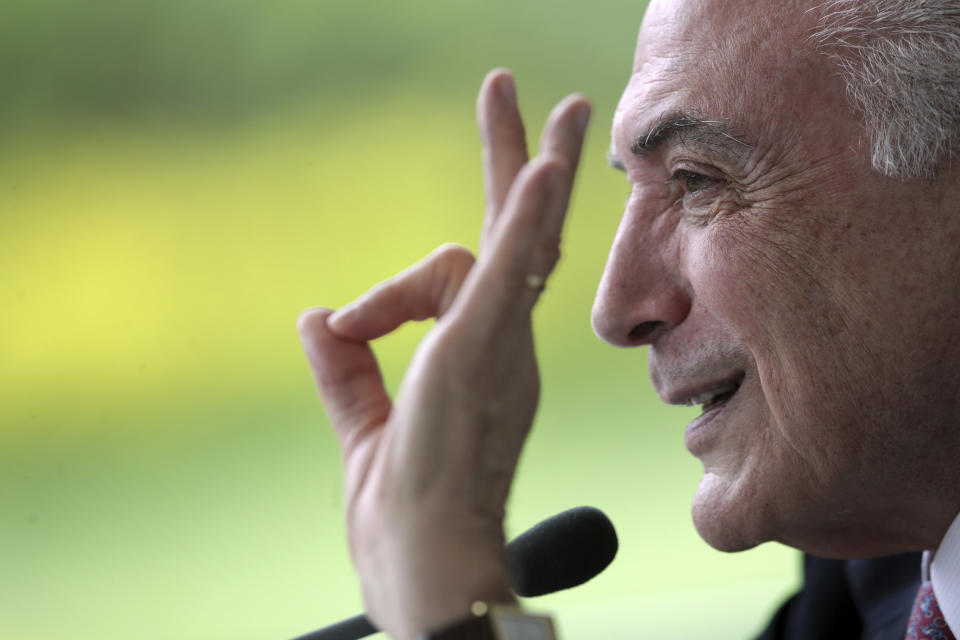 Brazil's President Michel Temer speaks during a breakfast with foreign correspondents at the presidential residence in Brasilia, Brazil, on Thursday, Dec. 6, 2018. Temer says he is not "the least bit worried" about corruption charges against him that could lead to jail time after he leaves office on Jan. 1. (AP Photo/Eraldo Peres)