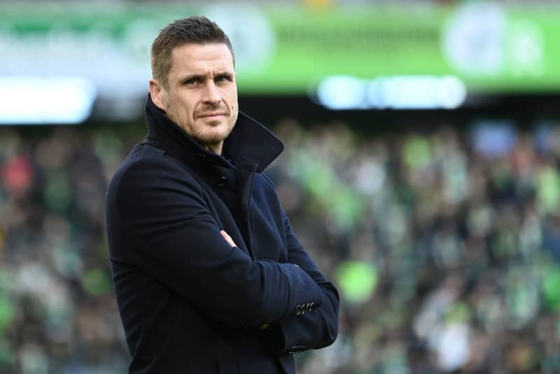 Sebastian Kehl, Borussia Dortmund's sports director, is pictured before the start of the German Bundesliga soccer match between VfL Wolfsburg and Borussia Dortmund at the Volkswagen Arena. Swen Pförtner/dpa