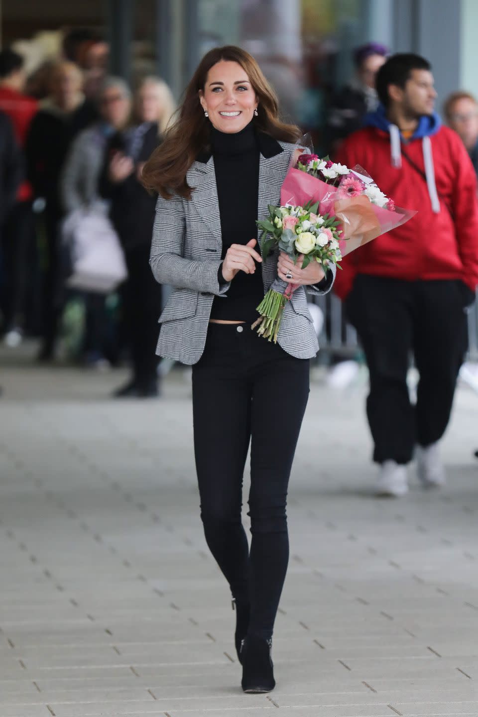 <p><em>October 30, 2018</em> — Kate checked out the Basildon Sporting Village in London wearing another tailored jacket, this time in a gray tweed, plus black skinny jeans, and ankle boots by <a href="https://www.nordstromrack.com/shop/product/3012297/aquatalia-faria-weatherproof-bootie?color=BLACK%20SUEDE" rel="nofollow noopener" target="_blank" data-ylk="slk:Aquatalia;elm:context_link;itc:0;sec:content-canvas" class="link ">Aquatalia</a>. </p>