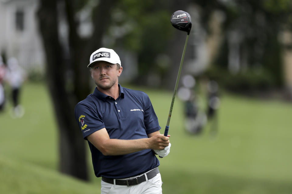 Mackenzie Hughes, of Canada, watches his tee shot from the third hole during the first round of the Travelers Championship golf tournament at TPC River Highlands, Thursday, June 25, 2020, in Cromwell, Conn. (AP Photo/Frank Franklin II)