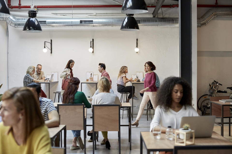 There seems to be as many laptops as there are coffee cups at some cafes these days. <em>(Photo: Getty)</em>