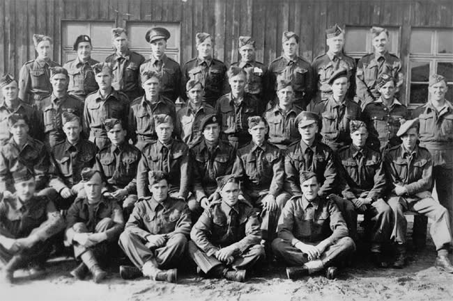 <p class="MsoNormal"><span>Photo Taken at Stalag VIII-B in Lamsdorf, Poland, circa 1942. Maurice Snook is in the top row, far right. Photo courtesy of <a href="http://www.thememoryproject.com/stories/828:maurice-ypres-junior-snook/" rel="nofollow noopener" target="_blank" data-ylk="slk:Historica-Dominion Institute;elm:context_link;itc:0;sec:content-canvas" class="link ">Historica-Dominion Institute</a>. </span></p>