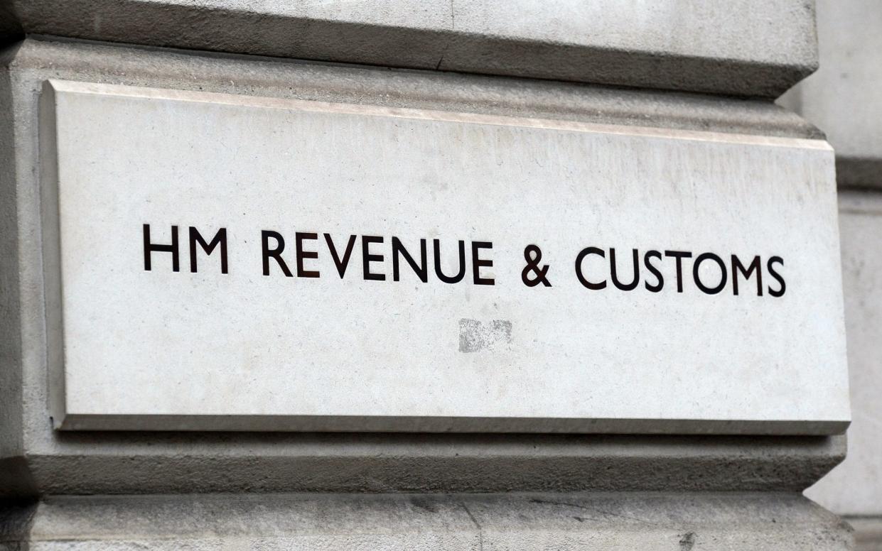 HMRC raised properties across the country as part of its investigation - PA