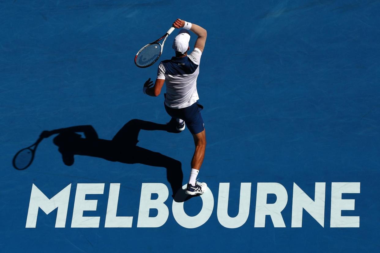 Up in arms: Novak Djokovic on his way to thrashing Donald Young on Monday: Getty Images