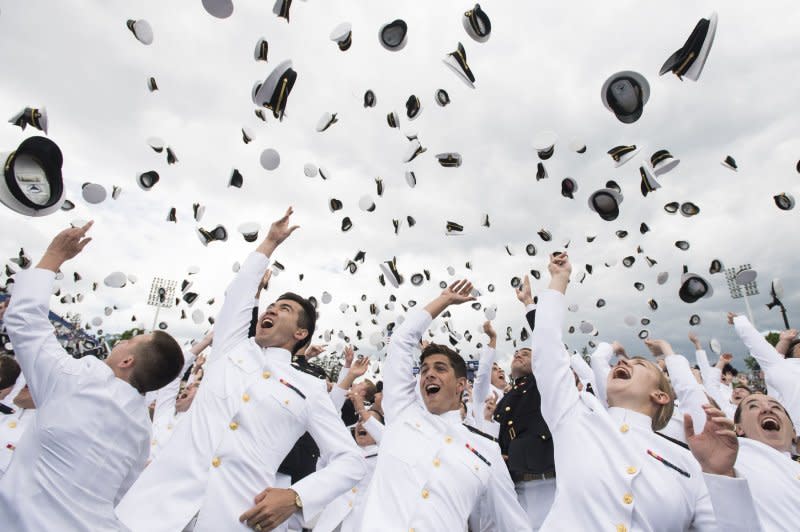 Graduating Midshipman throw their hats in the air at the conclusion on the graduation and commissioning ceremony at the United States Naval Academy in Annapolis, Md., on May 26. On October 10, 1845, the U.S. Naval Academy was formally opened. File Photo by Kevin Dietsch/UPI