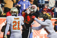 South wide receiver Jauan Jennings of Tennessee (15) catches a pass for a touchdown over North safety Jalen Elliott of Notre Dame (21) and North safety Josh Metellus of Michigan (14) during the second half of the Senior Bowl college football game Saturday, Jan. 25, 2020, in Mobile, Ala. (AP Photo/Butch Dill)