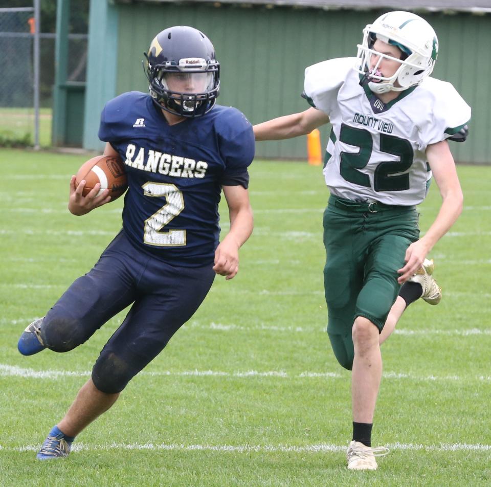 Traip Academy running back Seamus Berry carrying the ball during Saturday's 42-6 win over Mount View at Memorial Field in Kittery, Maine.