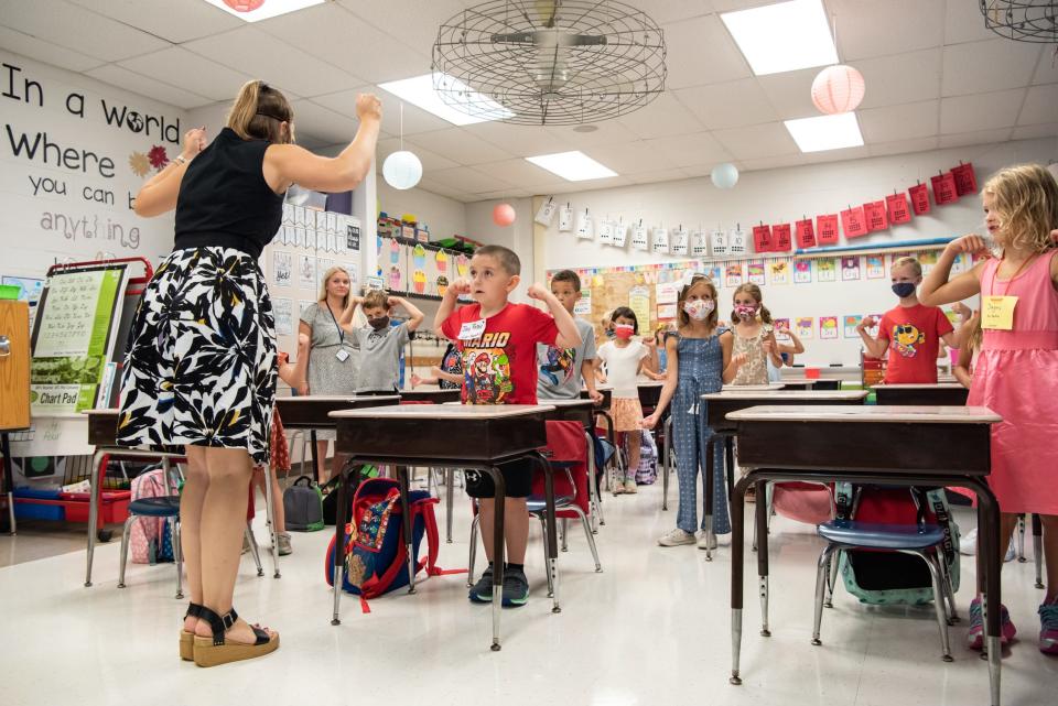 File - First grade teacher Ashley Fetter leads her class through a good morning song on their first day of the new school year in August at Linden Elementary School in Doylestown Borough. While teachers aren't part of their union, the Central Bucks support staff workers that fill various positions in and out of the classroom might soon have a new five-year contract after 11 months of stalled negotiations. Union members include educational assistants, custodians, administrative staff, facilities, security personnel and others.