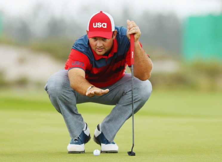 Patrick Reed sizes up a putt at the Olympic golf tournament. (Getty Images)