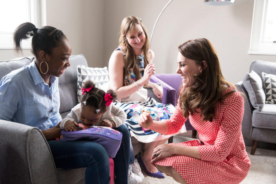 Kate meets a mother, Kirsty Francois, 21, and her daughter Teegan-Mia, 2, during a meeting with a parent support group at the launch of maternal mental health films in London, England. The educational films have been created by Best Beginnings, a charity partner of the Heads Together Campaign. <em>(Photo: Getty Images)</em>