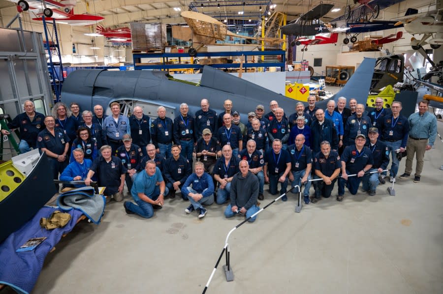 Volunteers work to restore the Wildcat. (Air Zoo)