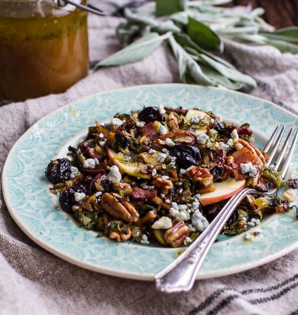 <strong>Get the <a href="https://www.halfbakedharvest.com/caramelized-brussels-sprout-salad-wblue-cheese-bacon-caramel-apple-vinaigrette/" target="_blank">Caramelized Brussels Sprout Pecan Salad with Bacon and Caramel Apple Vinaigrette recipe</a> from Half Baked Harvest.</strong> (Photo: <a href="https://www.halfbakedharvest.com/caramelized-brussels-sprout-salad-wblue-cheese-bacon-caramel-apple-vinaigrette/" target="_blank">Half Baked Harvest</a>)