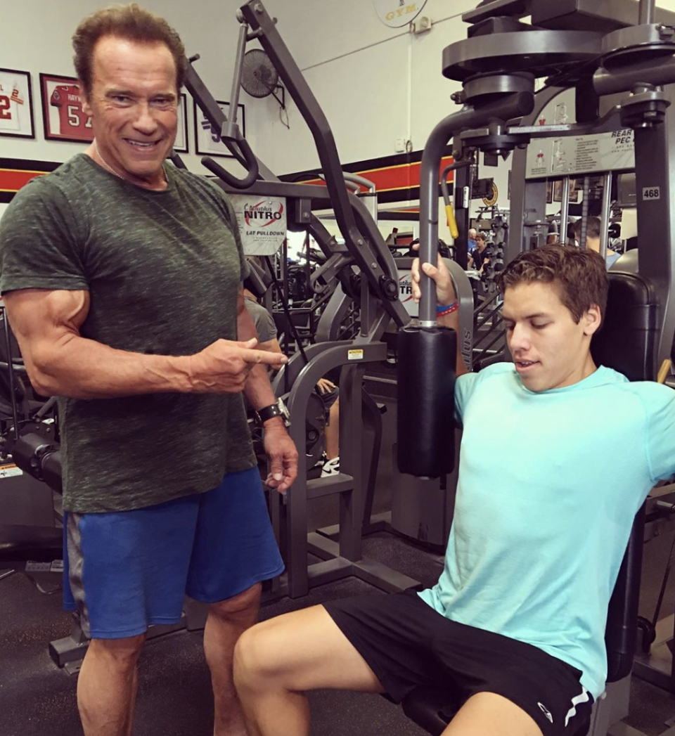 Arnold Schwarzenegger and Joseph Baena are pictured working out together in a photo that Baena shared in July. (Photo: Joseph Baena via Instagram)