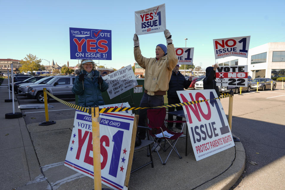 FILE - People gather in the parking lot of the Hamilton County Board of Elections as people arrive for early in-person voting in Cincinnati, Nov. 2, 2023. Voters in several states have used the citizen initiative process to protect access to abortion and other reproductive rights in the two years since the U.S. Supreme Court overturned a nationwide right to abortion. (AP Photo/Carolyn Kaster, File)