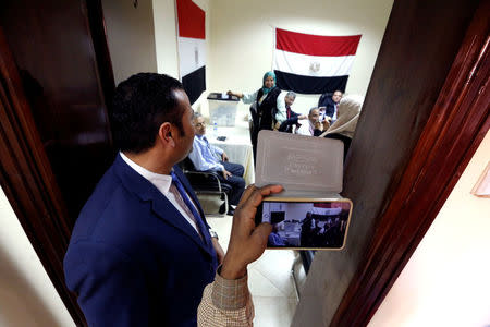 Egyptians living in Sudan cast their vote at the Egypt Embassy in Khartoum, Sudan March 16, 2018. REUTERS/Mohamed Nureldin Abdallah